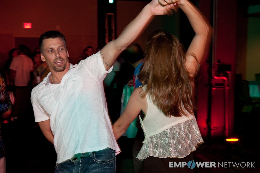 Couple dancing together at an evening party during Empower Network's 2012 Atlanta event